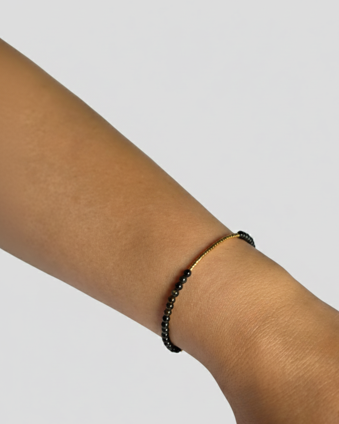 PULSERA PETITE NOIR & OR