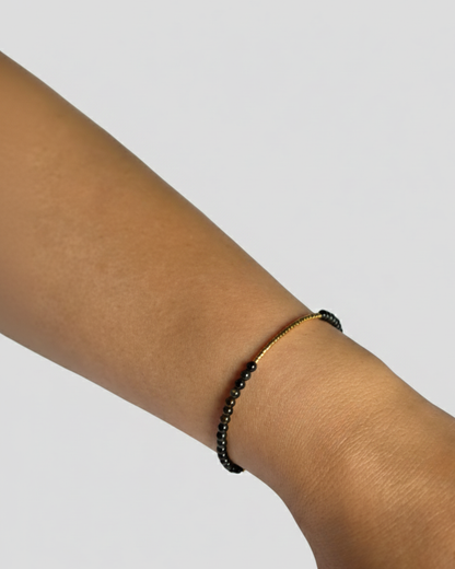 PULSERA PETITE NOIR & OR